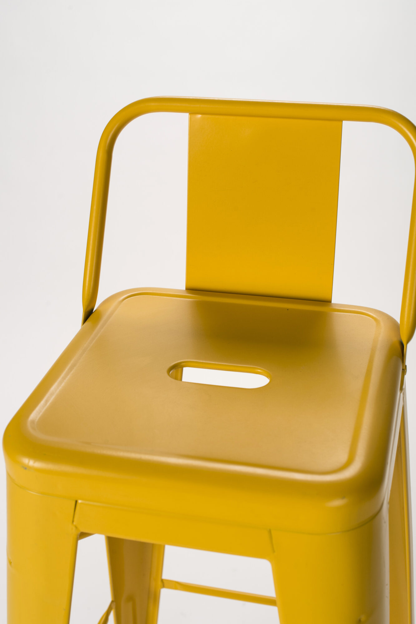 tabouret Tolix avec dossier jaune